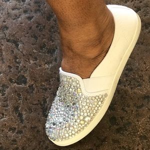 Handmade bejeweled sneakers.